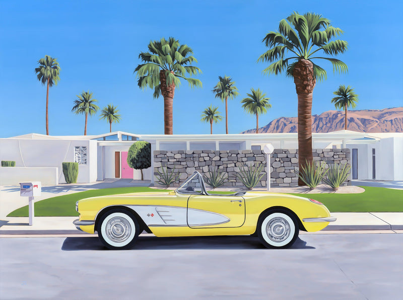 A stylish mid-century room with artwork of a 50's convertible parked outside a Palm Springs home, a nod to "Don't Worry Darling".