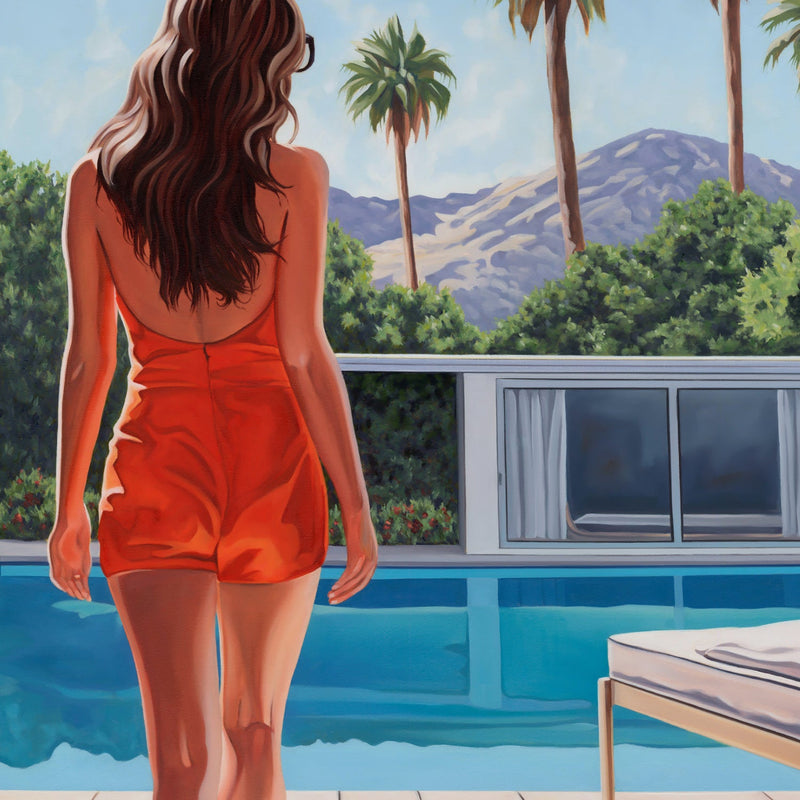 A woman by the poolside, enveloped in the golden glow of a California sunrise