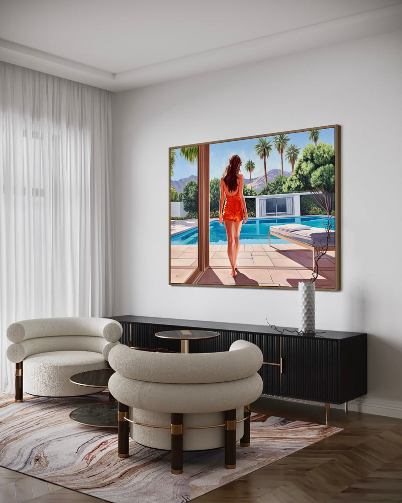 Stylishly adorned room showcasing a woman at a poolside, relishing the Californian morning sun amidst palm trees.