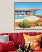 A stunning room with a breathtaking artwork depicting a woman in a bikini and floppy hat, lounging beside a sparkling pool and admiring the panoramic Los Angeles cityscape