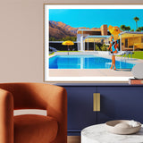 Mid-century modern room boasts Kaufmann house artwork & new take on Slim Aarons Poolside Gossip. Woman relaxes poolside in floppy hat on a sunny day