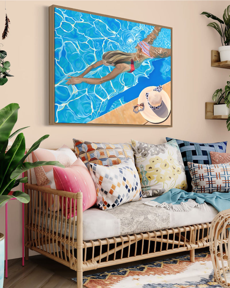 An eye-catching artwork in a modern living room portraying a young girl in a vibrant bikini, immersed in a stunning pool